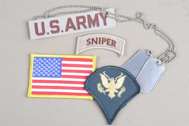 istock US ARMY Specialist rank patch, sniper tab, flag patch and dog tag 1194342361