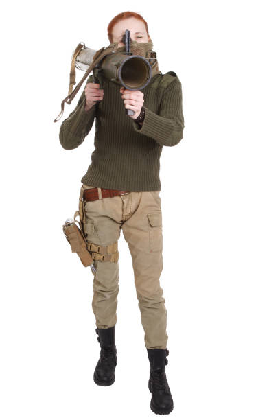 istock girl mercenary with RPG rocket launcher 1194342377