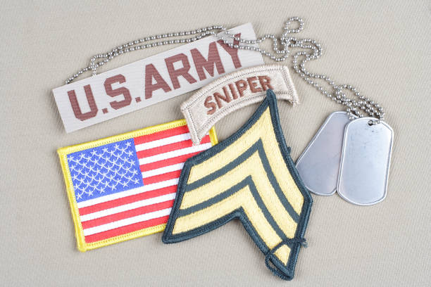 istock US ARMY Sergeant rank patch, sniper tab, flag patch and dog tag 1194342407