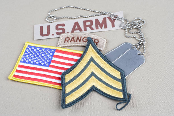 istock US ARMY Sergeant rank patch, ranger tab, flag patch and dog tag 1194342514