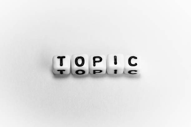 istock White cubes with word TOPIC on white background 1194343851