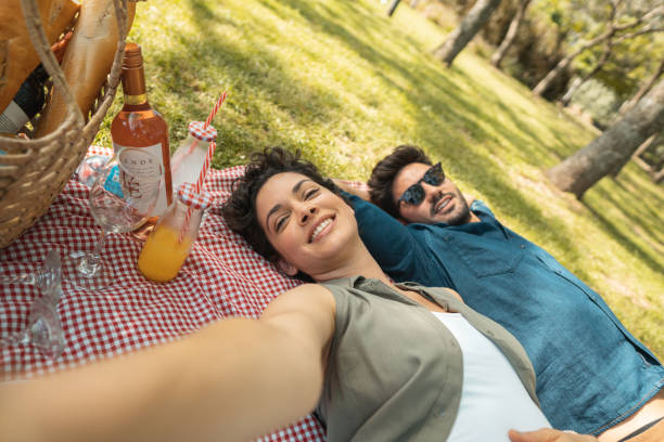 istock Couple celebrating with picnic 1194343886