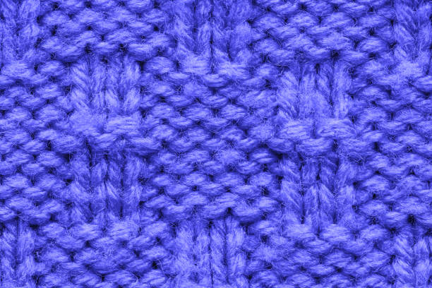 istock The texture of a knitted sweater. Blue pattern. 1194344008