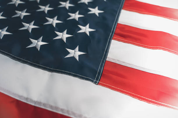 istock USA flag background. American flag, close up 1194345100