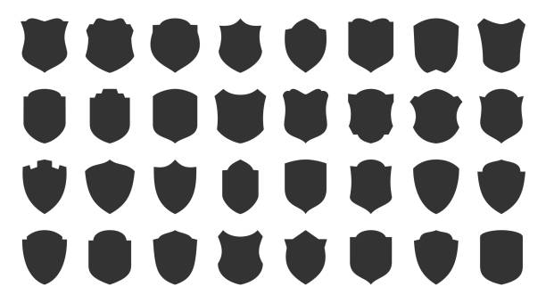 Shield safety defense protect vector glyph icons Shields glyph icons set. Security symbol. Coat arms silhouette icon. Safety, defense, protection signs for emblem, logo, badge. Privacy protect black sign design. Isolated vector illustration badge stock illustrations