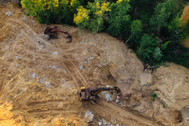 istock Dump excavators on city dump yard, aerial view 1194355729