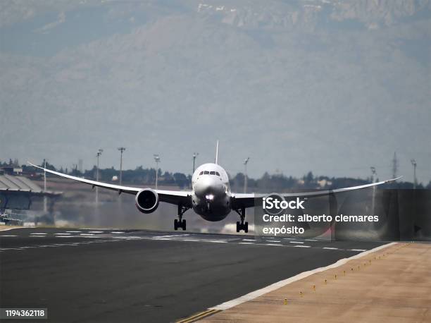 Plane Taking Off From An Airport Stock Photo - Download Image Now - Manchester International Airport, Airport, Spain