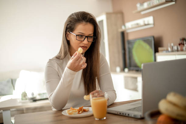 istock Girl in casual clothing using laptop 1194372080