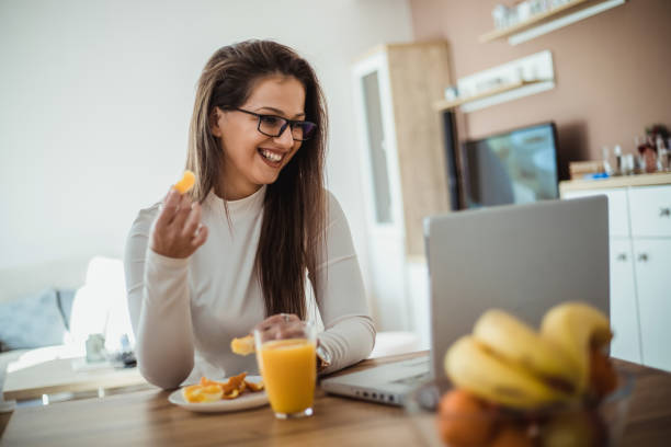 istock Girl in casual clothing using laptop 1194372202