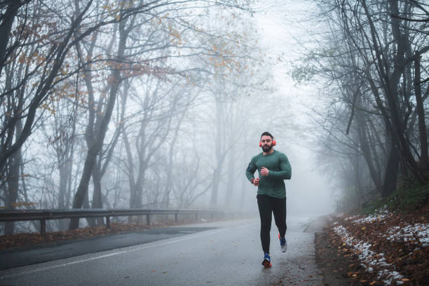 istock Man Running On The Road. 1194372248