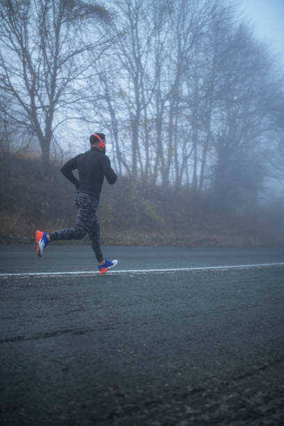 istock Man Running On The Road. 1194372250