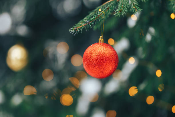 istock Christmas balls on tree outdoor 1194372297