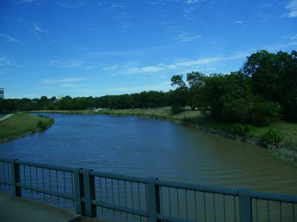 istock Riverside scenery with steel railings by the roadside 1194377843
