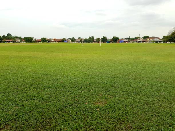 istock Play ground with housing area at the back 1194389437