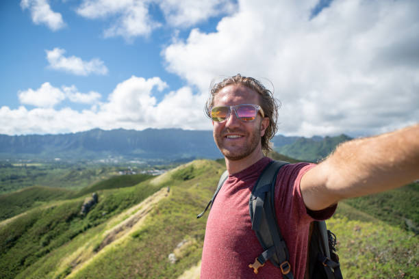 istock Young man takes selfie at on mountain hike 1194392963