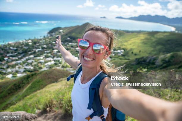 Young Woman Hiking In Hawaii Takes Selfie Stock Photo - Download Image Now - Awe, Hawaii Islands, One Woman Only