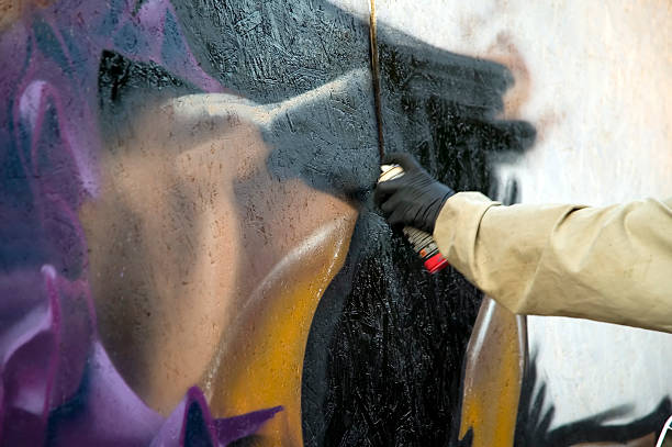 istock Man is painting on the wall 119439327