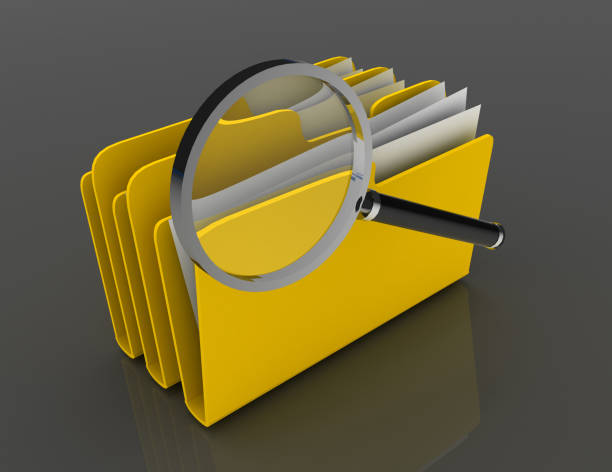 Magnifying glass over the blue folders. Files investigation.