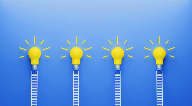 istock White Ladders and Yellow Lightbulbs in A Row Leaning on Blue Wall 1194394966