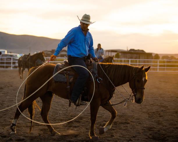 istock Cowboy warming up before event at a rodeo arena 1194396887