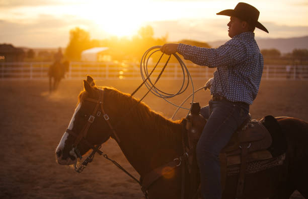 istock Cowboy warming up before event at a rodeo arena 1194396999