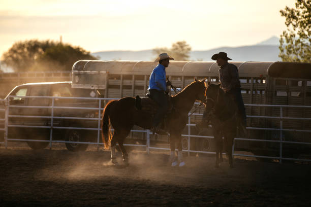 istock Cowboys at rodeo arena 1194397032
