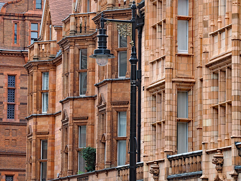 Colorful terracotta facades of apartment buildings in the Mayfair district of London, England
