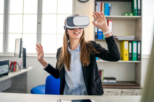 istock Woman trying a VR device 1194404876