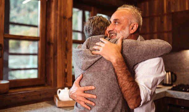 istock Senior couple embracing passionate at home 1194407245