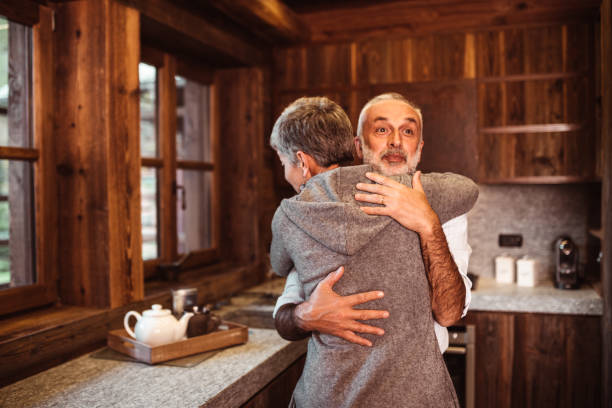 istock Senior couple embracing passionate at home 1194407273