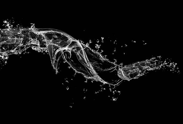istock WATER SPLASH FLOWING WATER ON BLACK BACKGROUND 1194410307
