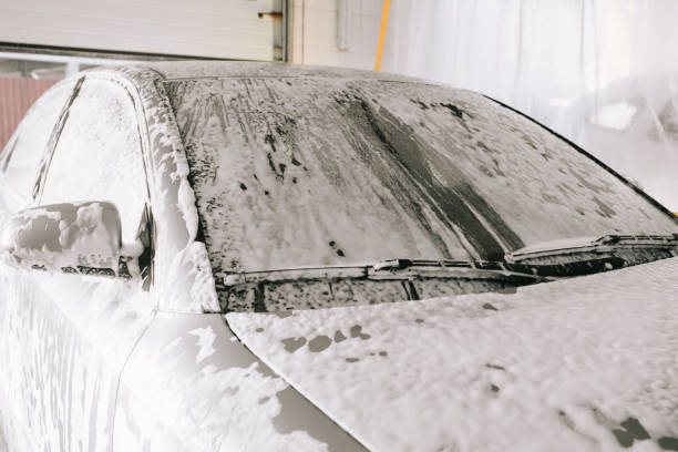 istock Gray car at the sink in the foam 1194410314