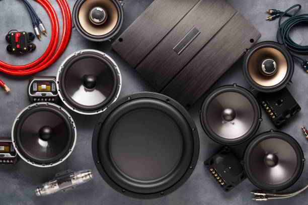 car audio, car speakers, subwoofer and accessories for tuning. Dark background. Top view. car audio, car speakers, subwoofer and accessories for tuning. Dark background. Top view. stereo photos stock pictures, royalty-free photos & images