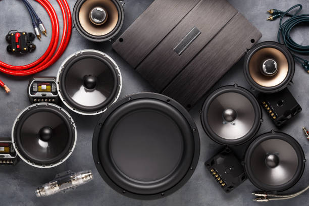 car audio, car speakers, subwoofer and accessories for tuning. dark background. top view. - car stereo imagens e fotografias de stock