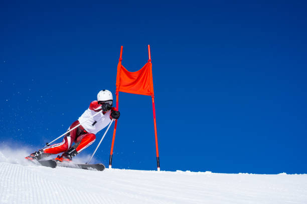 istock professional alpine skier skiing super g with clear blue sky 1194413116