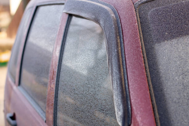 istock Car on the street covered by icing - selective focus 1194416574
