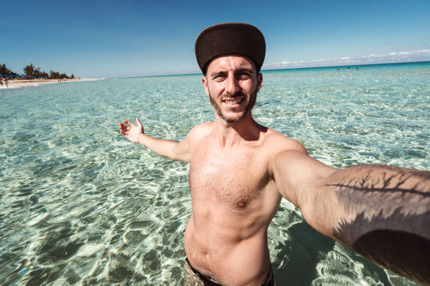 istock man take a selfie in cuba 1194420420