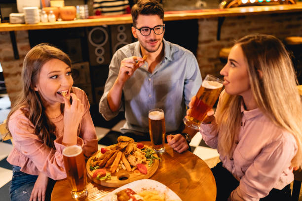 istock Friends on beer and pub food 1194425363
