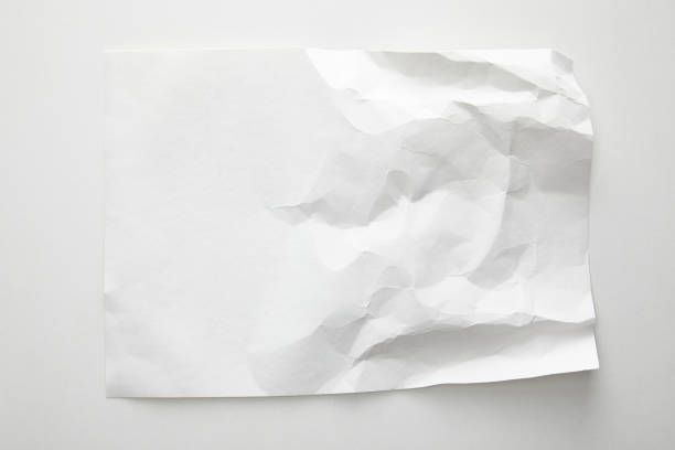 istock top view of empty crumpled paper on white background 1194430755