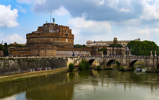 Rome, Italy, May 8, 2018: The Castel was built between 135-139. It has been demolished, repaired and rebuilt several times over the years. Originally it was built by the Roman Emperor Hadrian as a family mausoleum, later served as a papal fortress connected by a tunnel in the walls with the Vatican, residences and prisons. It currently houses a museum dedicated to the history of the building and the city of Rome.