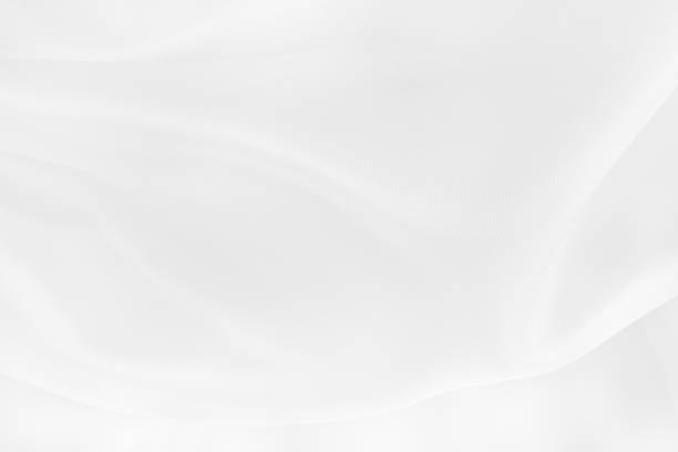 istock White fabric cloth texture for background and design art work, beautiful crumpled pattern of silk or linen. 1194430918