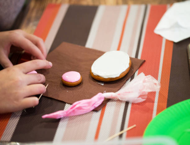 istock Master class on baking and painting gingerbread. Gingerbread cookies are the making process. 1194431638