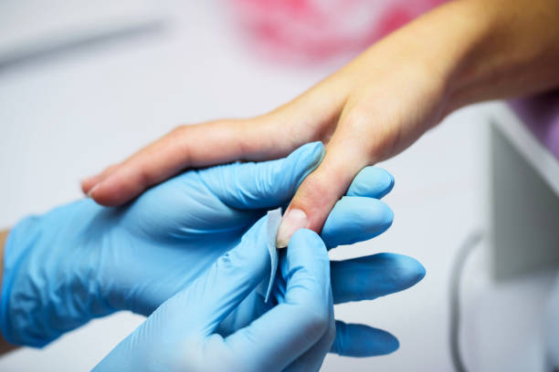 istock Manicure process in beauty salon, close up 1194431949