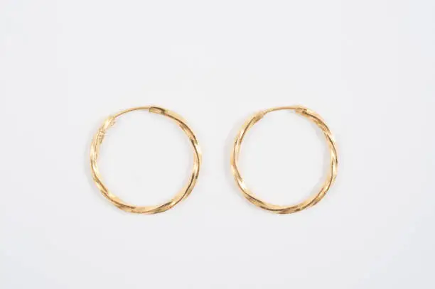 Photo of Loop gold earrings.