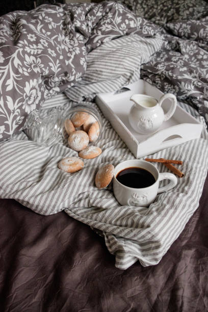 istock coffee with cookies in bed. Interior details. Gray background. Beautiful flat lay 1194436702