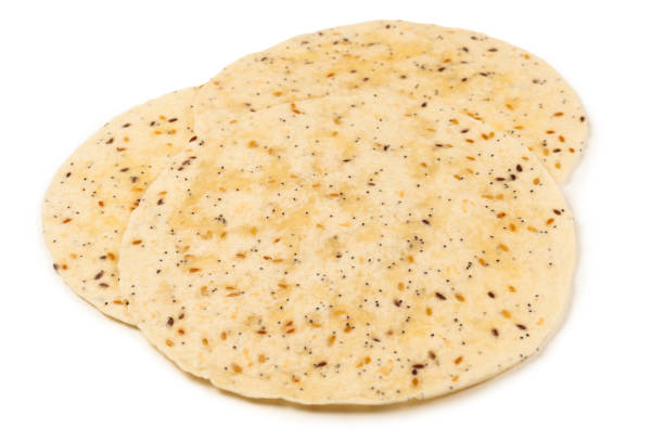 istock Pitta bread with seeds isolated on white 1194436841