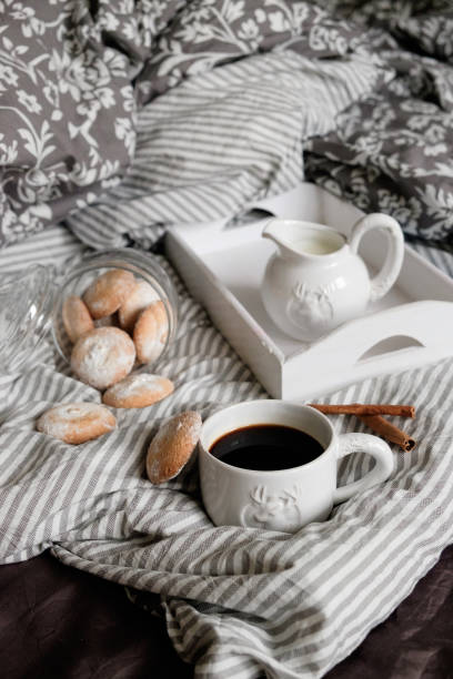 istock flat lay in scandinavian style. Coffee and breakfast in bed. 1194436890