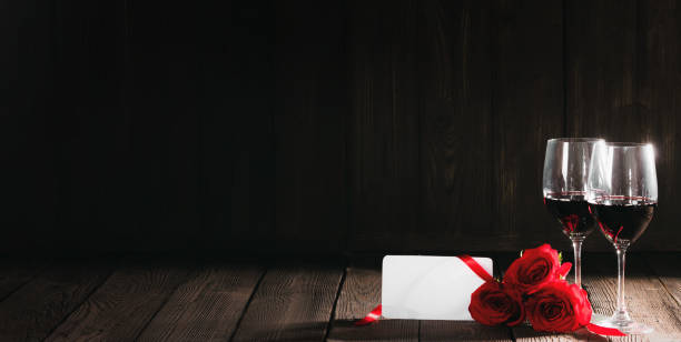 istock Wine roses and card 1194441513
