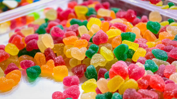 istock Sweet jelly beans in a heart shape covered with sugar. 1194441931