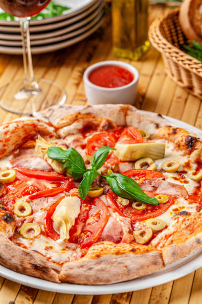 istock Italian food concept. Thin pizza with thick sides on a white plate. background image. copy space 1194442802
